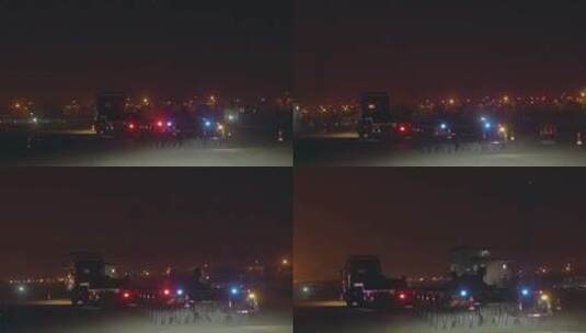 夜间行驶在机场的卡车高清在线视频素材下载