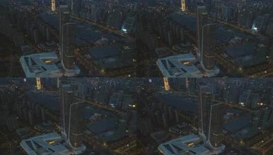 航拍夜幕下的南京双子塔和南京眼高清在线视频素材下载