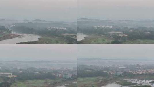 云雾缭绕远山河流摇沿河建筑小区别墅高清在线视频素材下载