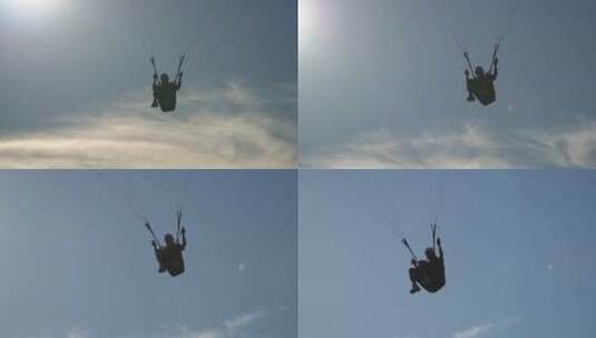 滑翔伞运动员在空中自由滑翔高清在线视频素材下载