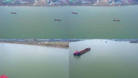 5.4K冬季湘江中航行的货船航拍空镜高清在线视频素材下载