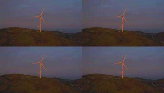 湖北利川齐岳山上夕阳里的风车高清在线视频素材下载