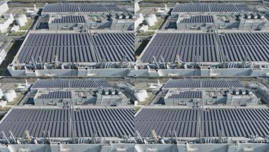 现代工厂屋顶太阳能光伏发电板高清在线视频素材下载