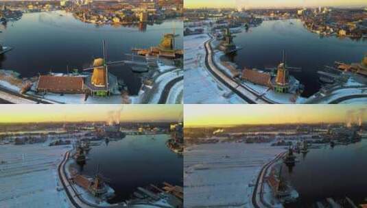 Zaanse Schans风车村的木制风力磨坊在冬季与雪景雪高清在线视频素材下载