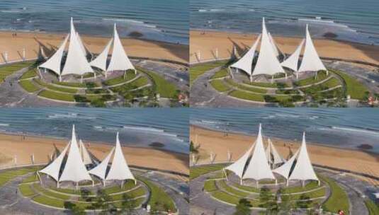 航拍俯瞰威海国际海水浴场大白帆广场沙滩高清在线视频素材下载