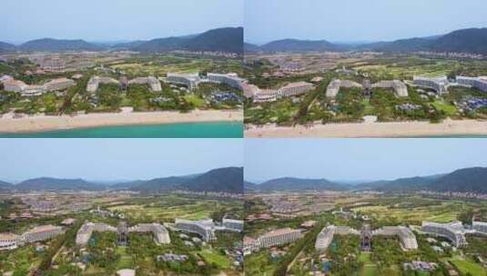 中国海南三亚亚龙湾海岸线高级度假酒店航拍高清在线视频素材下载