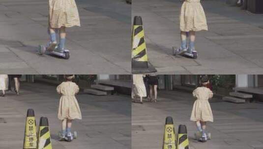 河坊街小孩玩滑板车高清在线视频素材下载