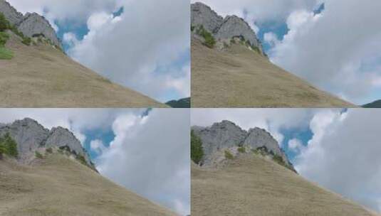 低角度拍摄美丽的云彩爬山，法国阿尔卑斯山高清在线视频素材下载