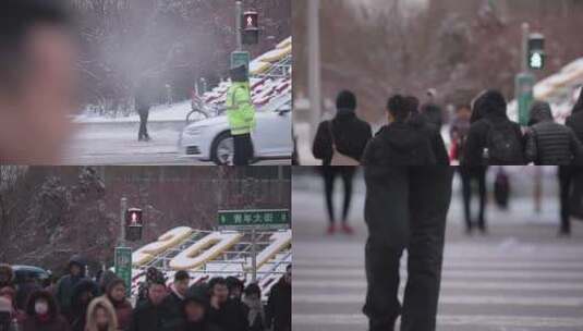 冬天交警指路口执勤 下雪天行人行走过马路高清在线视频素材下载