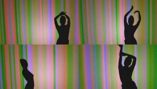 彩色背景下女性舞蹈剪影高清在线视频素材下载