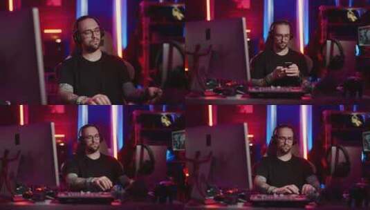 玩虚拟电子游戏的人玩家微笑的设计师坐在电高清在线视频素材下载