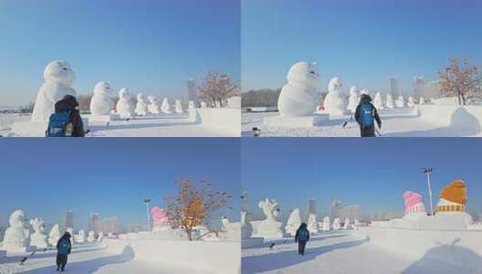 背着背包的人走在雪雕展览场地中生肖大雪人高清在线视频素材下载