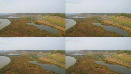 航拍吉林敦化市雁鸣湖湿地沼泽河流森林沼泽高清在线视频素材下载