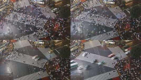 延时十字路口行人过马路下雨天城市景观高清在线视频素材下载