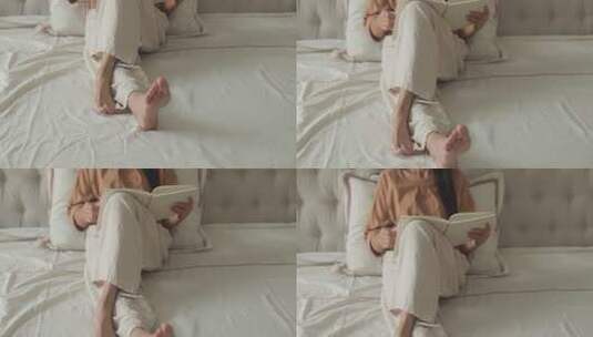 女性坐于卧室床上的居家场景高清在线视频素材下载