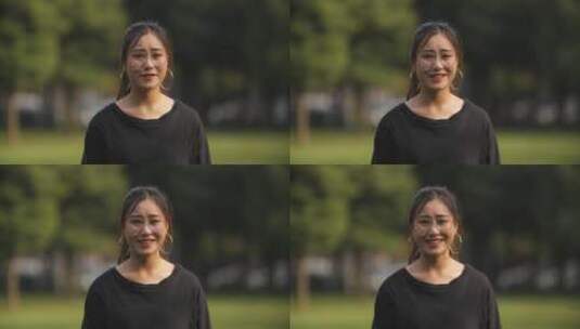 一位戴眼镜的女大学生看镜头微笑的肖像高清在线视频素材下载