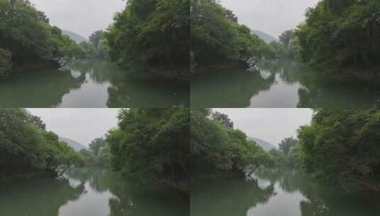 航拍中国浙江杭州浴鹄湾雨天自然水上树林高清在线视频素材下载