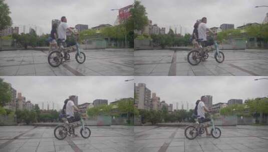 情侣推着自行车行走高清在线视频素材下载
