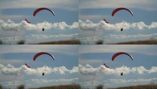 滑翔伞运动员在空中自由翱翔高清在线视频素材下载