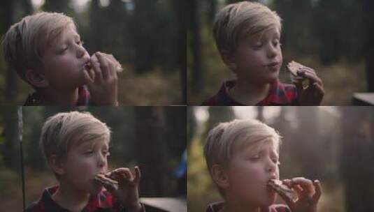 户外吃食物的男孩高清在线视频素材下载
