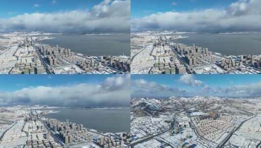 航拍威海经区雪后的山海街景高清在线视频素材下载