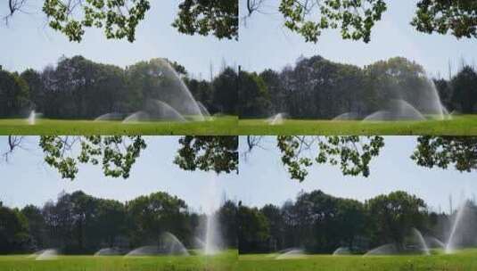 城市草坪洒水喷水逆光升格视频高清在线视频素材下载