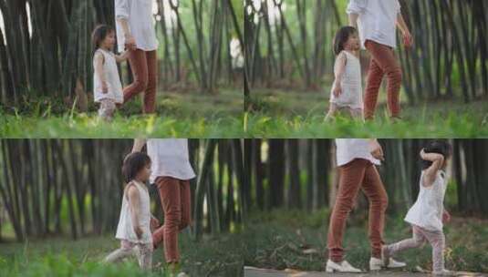 小女孩和妈妈在一起走在成都望江公园竹林高清在线视频素材下载