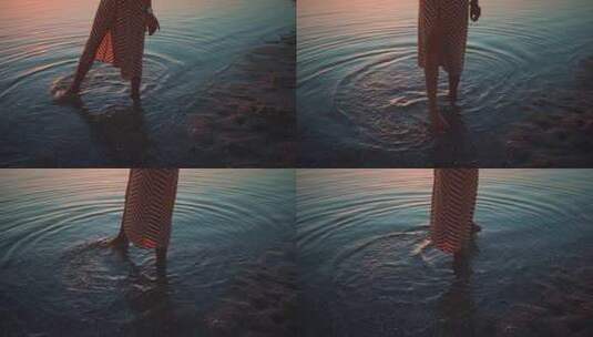 美女在海边用脚玩海水高清在线视频素材下载