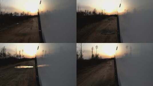 汽车行驶在颠簸的乡村土路上高清在线视频素材下载