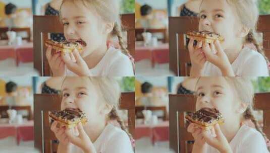 小女孩吃巧克力面包高清在线视频素材下载
