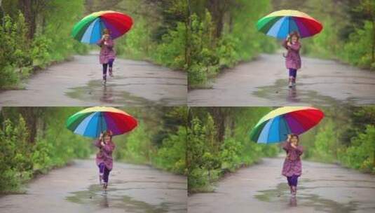 拿着雨伞的小女孩蹦蹦跳跳高清在线视频素材下载