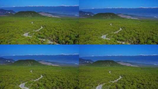 雪山脚下的腾冲火山森林公路高清在线视频素材下载