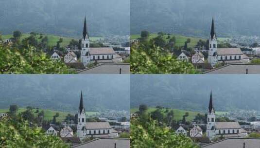 全景列支敦士登与阿尔卑斯山山谷绿地上的房屋高清在线视频素材下载