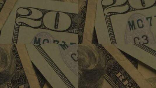 美国鹰盾背景上美国纸币的旋转镜头-MONEY 0415高清在线视频素材下载