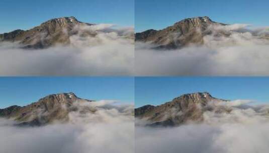 白雪皑皑和烟雾弥漫的山脉高清在线视频素材下载