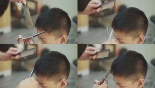 男孩在理发店理发高清在线视频素材下载
