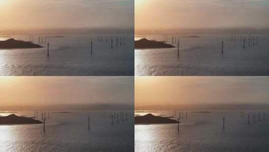 夕阳下的海上风力发电2（福州平潭）高清在线视频素材下载
