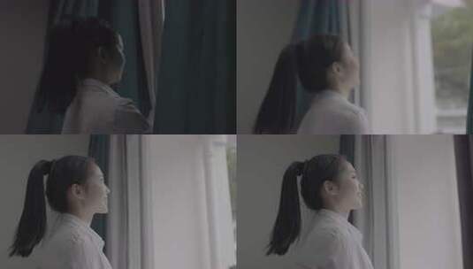 女子拉开窗帘瞬间高清在线视频素材下载
