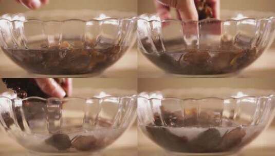 玻璃碗清洗泡发黑木耳 (6)高清在线视频素材下载