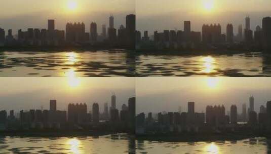 武汉市汉街沙湖夕阳湖面高楼金色709高清在线视频素材下载