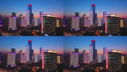西安地标高新区都市之门高楼大厦夕阳航拍高清在线视频素材下载