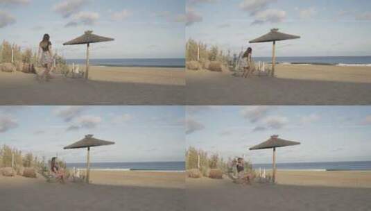4K升格美女海边沙滩行走海风高清在线视频素材下载