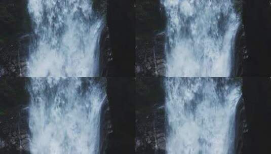 飞流瀑布侧面面 特写 拉丝水流 前景石头高清在线视频素材下载
