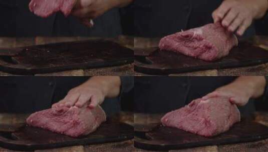 新鲜生牛肉在案板上的烤牛肉高清在线视频素材下载