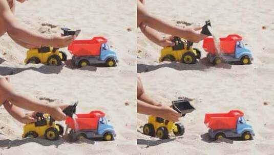 沙滩上玩塑料车的小男孩高清在线视频素材下载