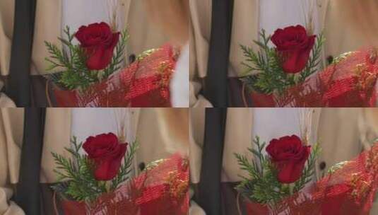 男子手里娇艳的红玫瑰高清在线视频素材下载
