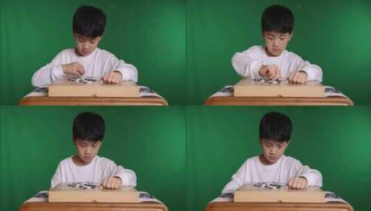 中国小男孩在下围棋高清在线视频素材下载