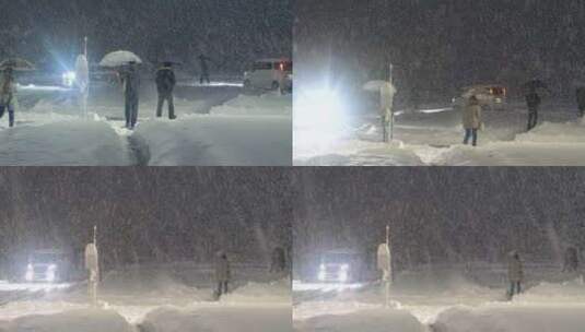 暴雪天气人们撑着伞出行高清在线视频素材下载