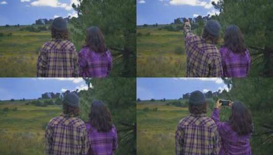 情侣户外草地拍照高清在线视频素材下载