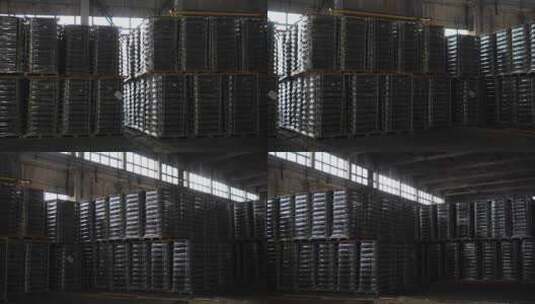 堆放在仓库里的金属轮子高清在线视频素材下载